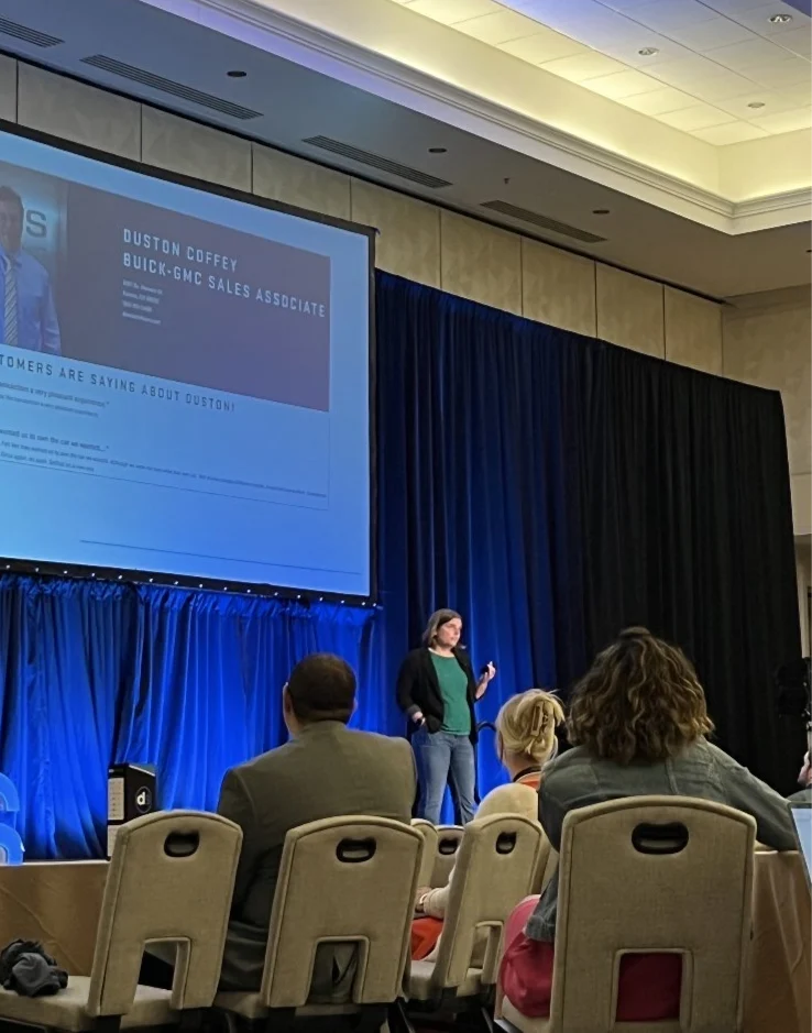 Alli Berry speaking on stage